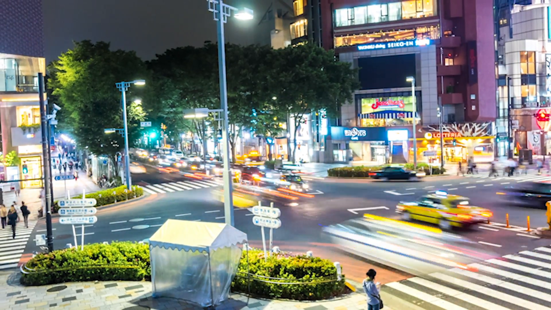 tokyo-19-may-zoom-out-timelapse-of-a-busy-intersection-in-harajuku-showing-many-pedestrians-and-traffic-on-19-may-2015-in-tokyo-japan_vyf-8coeg__F0000.png