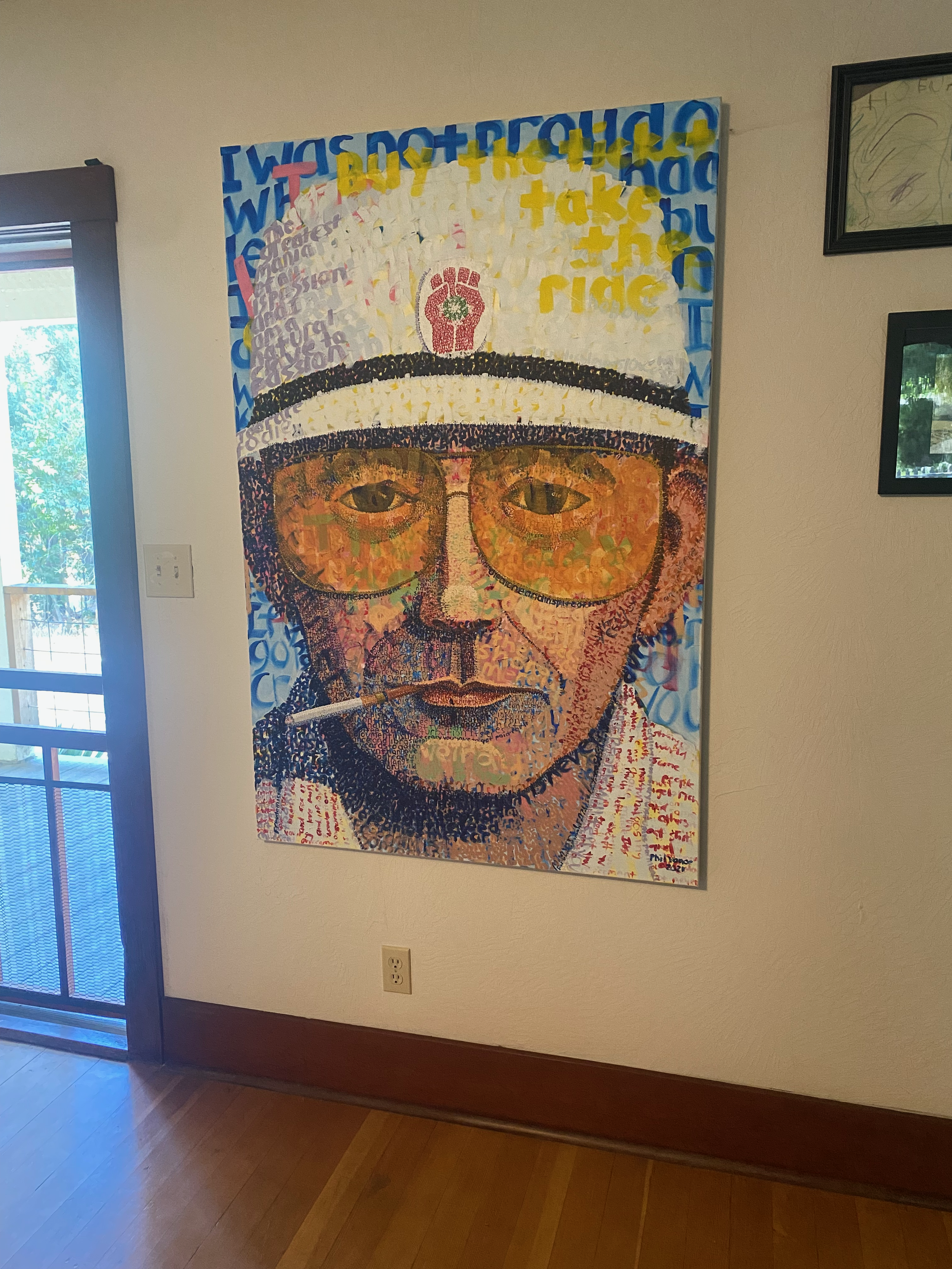 Hunter S Thompson Word Portrait by Phil Vance hanging on Wall.png