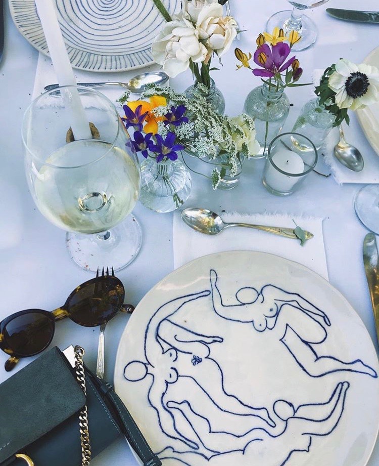 line drawn dancers on plate