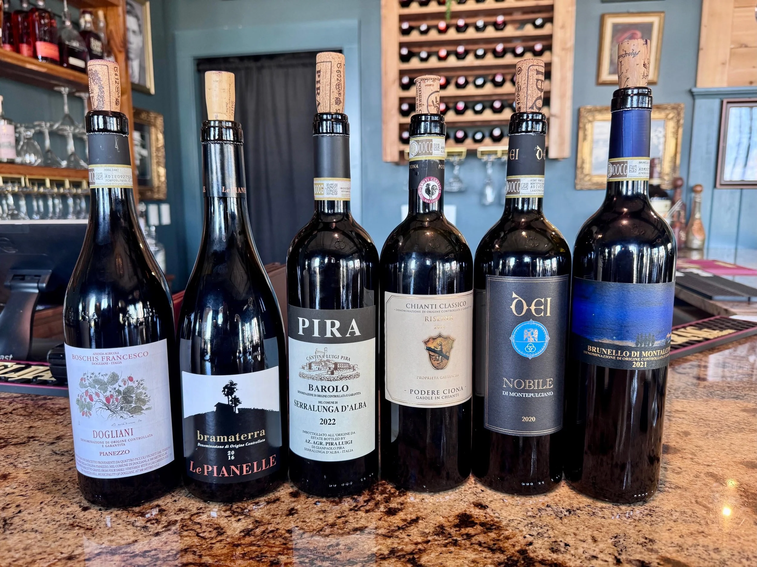 A tour through Italy from north to south&mdash;spanning alpine Nebbiolo structure, Chianti Classico elegance, and the deep, age-worthy core of Brunello. This lineup moves from bright, early-drinking charm to serious, cellar-driven power, showing just