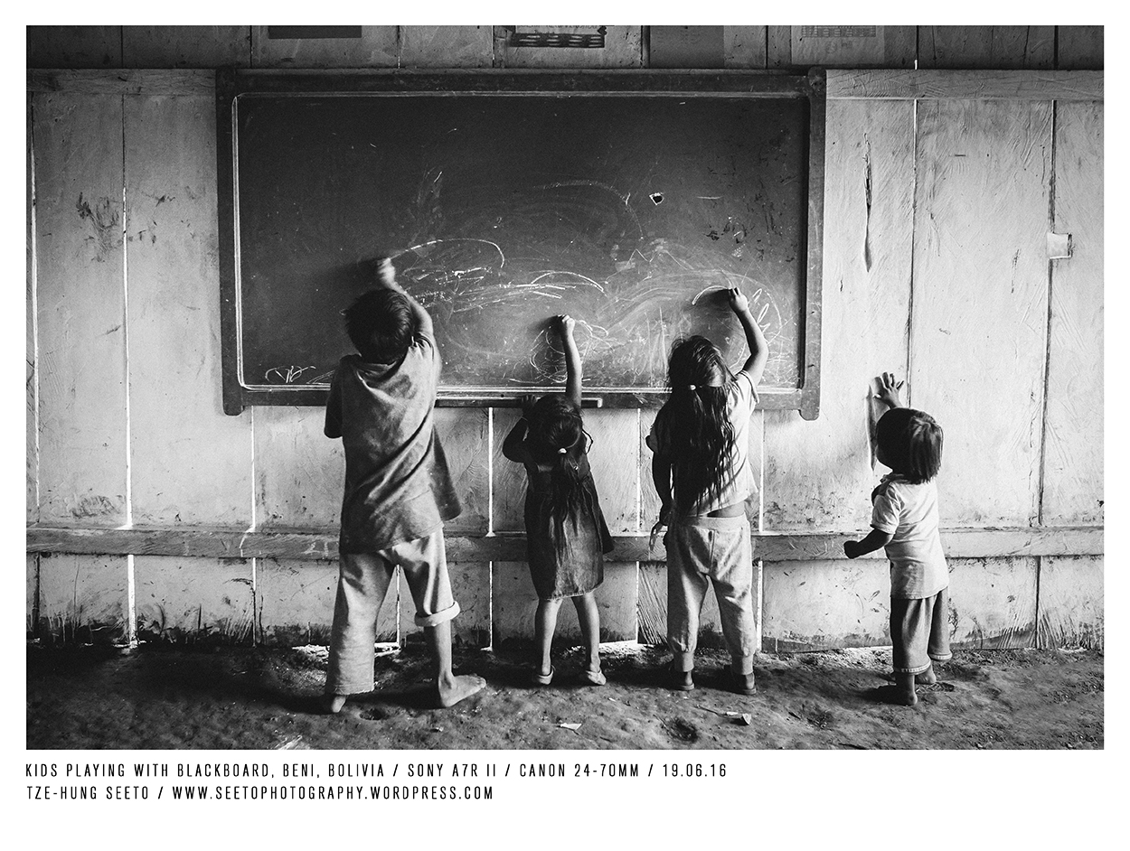 Bolivia, Oromomo, Kids playing with blackboard_CP.jpg