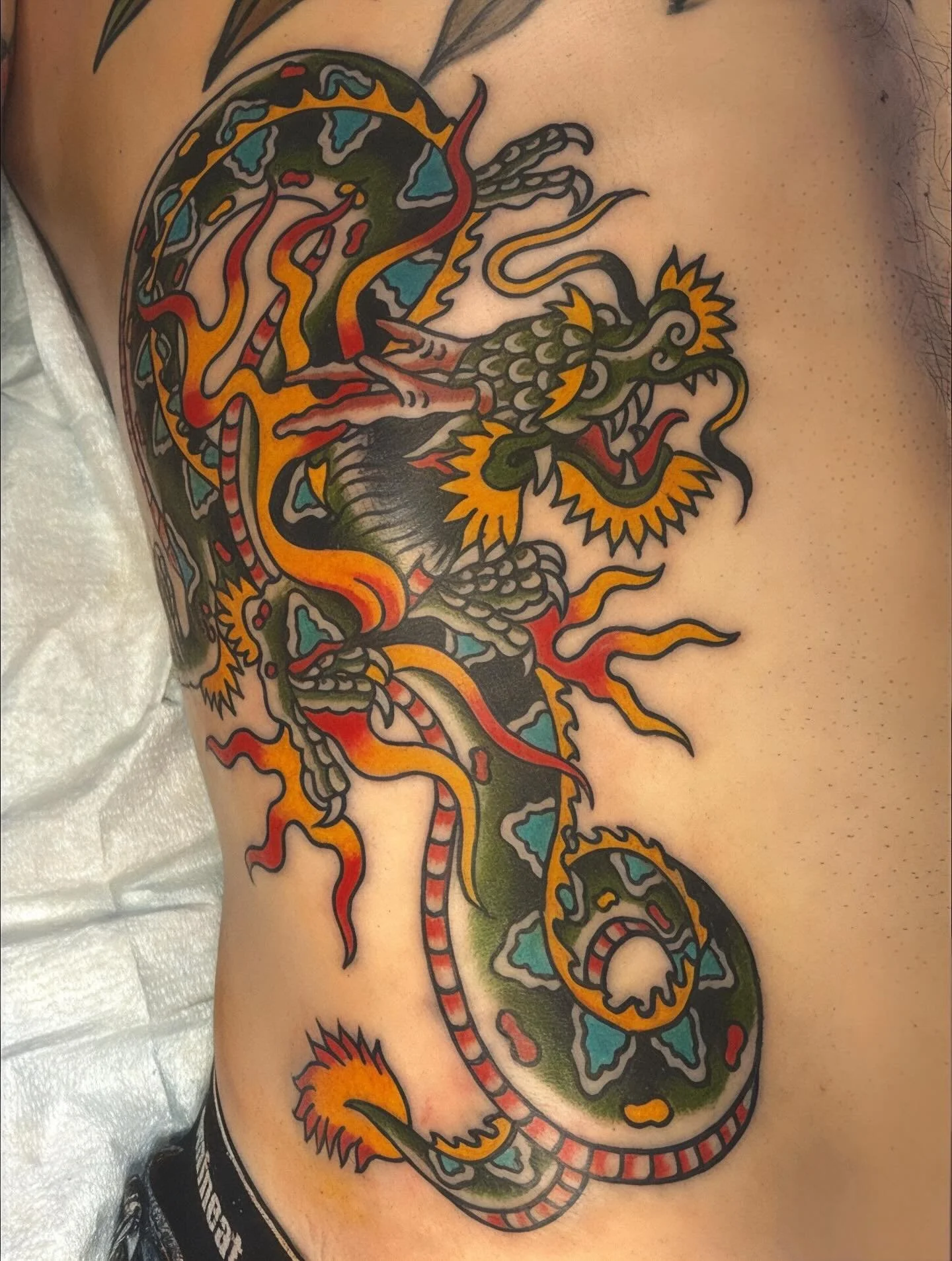 Dragon by @anthonypapallo 🐉
⠀⠀⠀⠀⠀⠀⠀⠀⠀
3KBK@THREEKINGSTATTOO.COM
.
.
.
#threekingstattoo #3kbk #traditionaltattoo #tattoo #tattoos #traditional #art #ink #tattooartist #traditionaltattoos #inked #blackwork #tattooflash #boldwillhold #colortattoo #neo