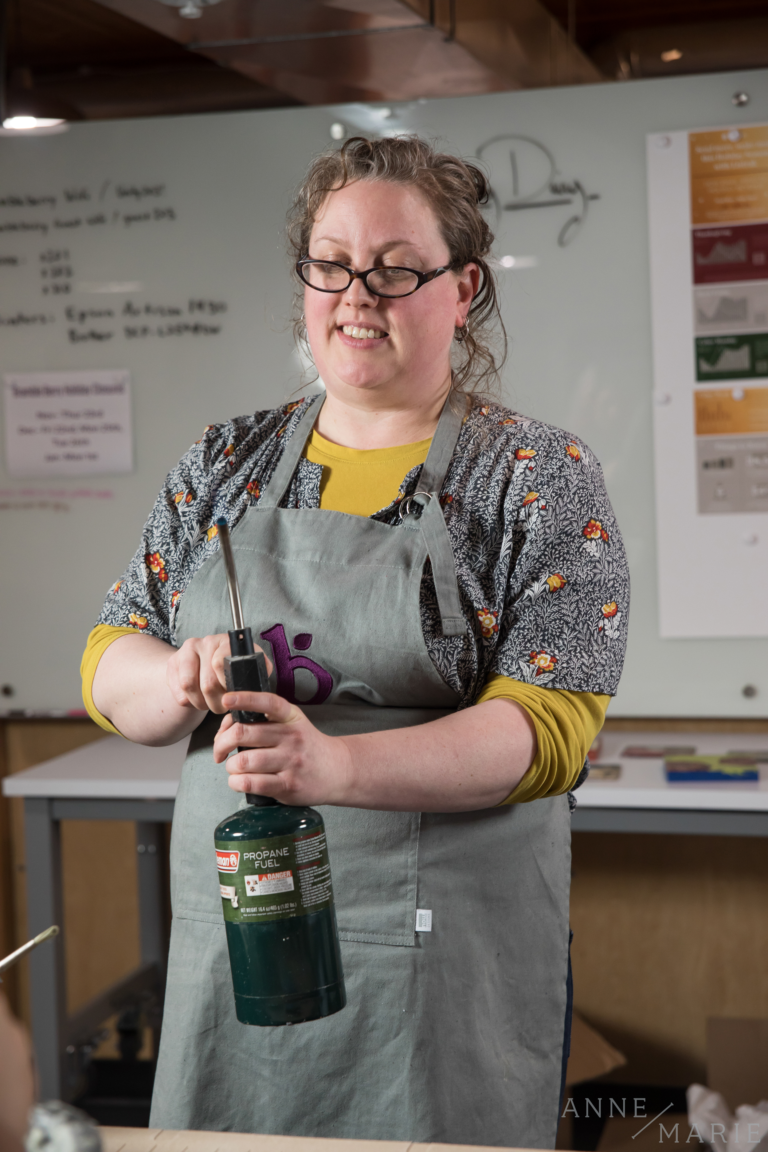  Amber, Bramble Berry's chief marketing officer, demonstrates how to use the blow torch. 