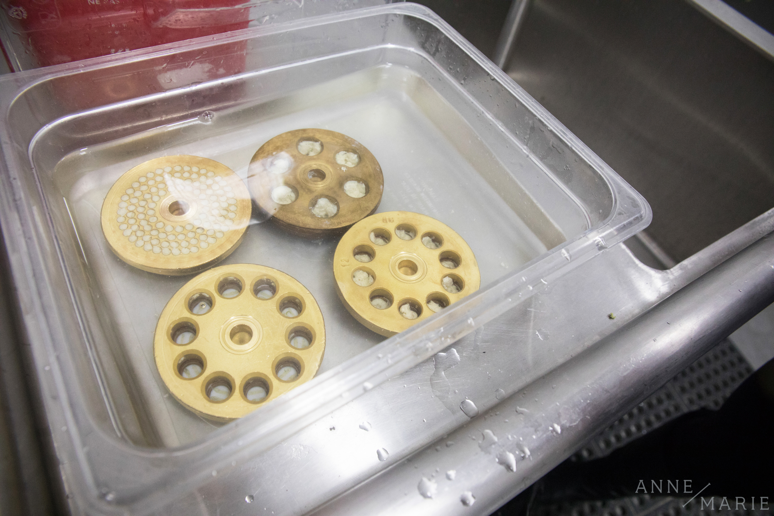  These are what create the pasta shapes. The dough is pushed through them and forms their shape. 