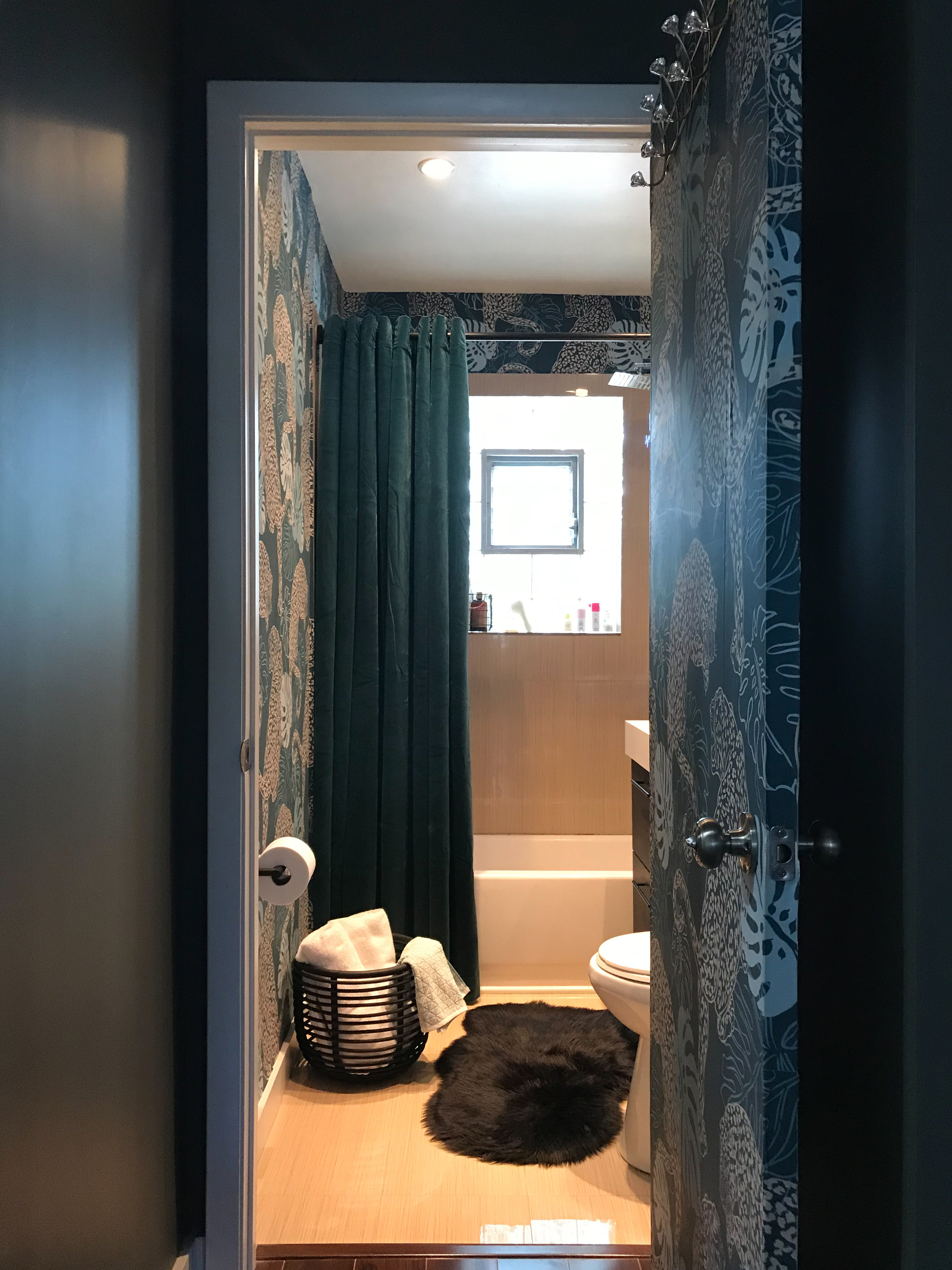 I love how Blake used a velvet curtain here. Definitely a unique option!