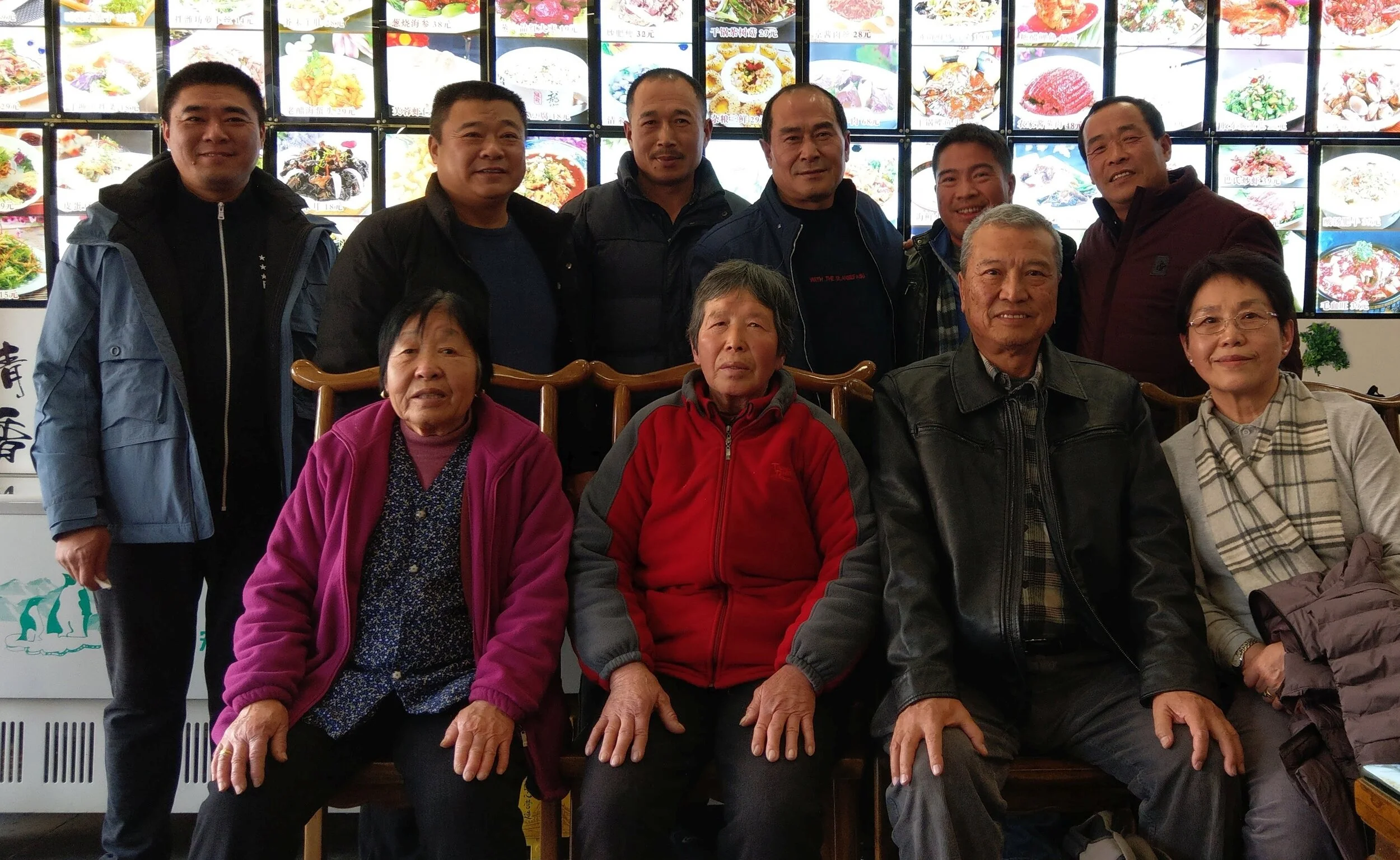Some of my living relatives still residing in Yanggu. They are tall and burly Northern Chinese folks as seen with my three second cousins (one to my right and two to my left), and two second cousins, once removed (far left). Mom is Southern Chinese …