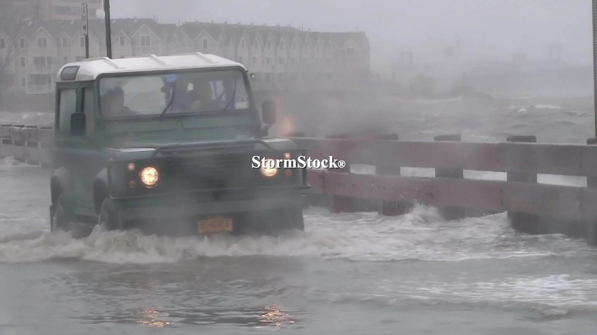 Green SUV drives through storm surge, Hurricane Sandy