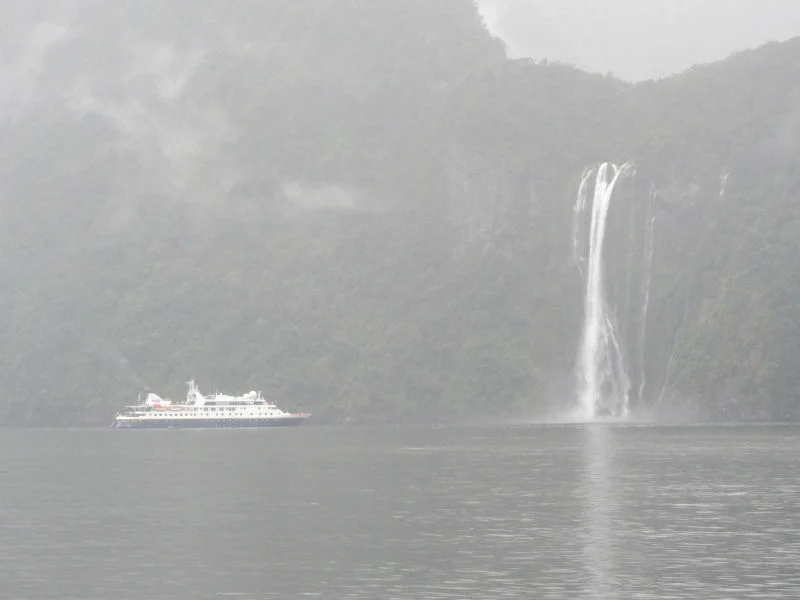 Cruise Ship Near Waterfall