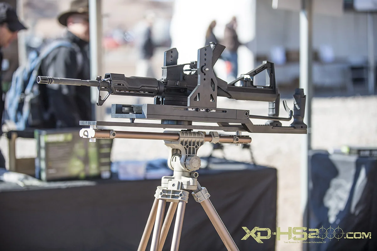 Slide Fire had a cradle on a tripod that allowed the mount to do all of the bump firing. All the user had to do is pull the paddle trigger. 