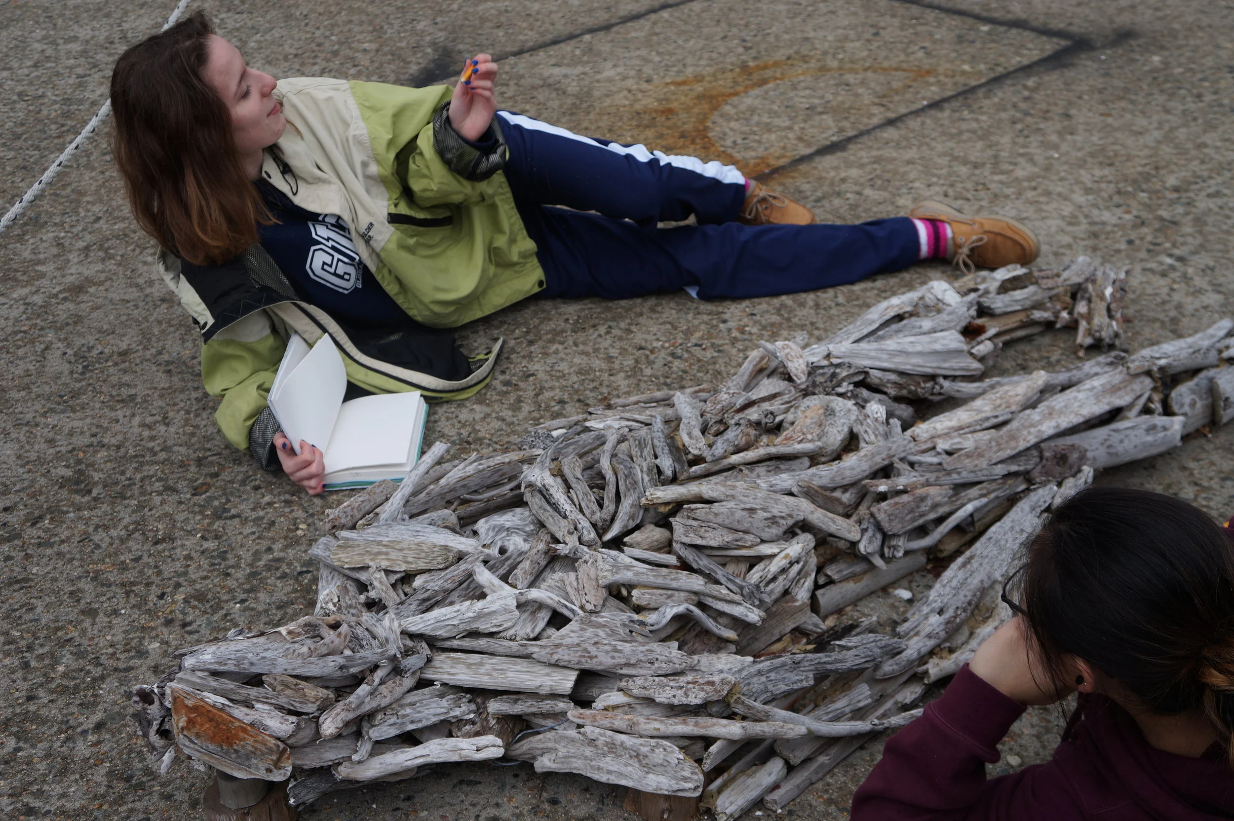 Checking out art at the port!     📸: Sabrina Fay 