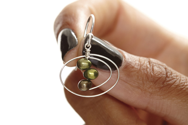 Oval Spiral Hand crop.jpg