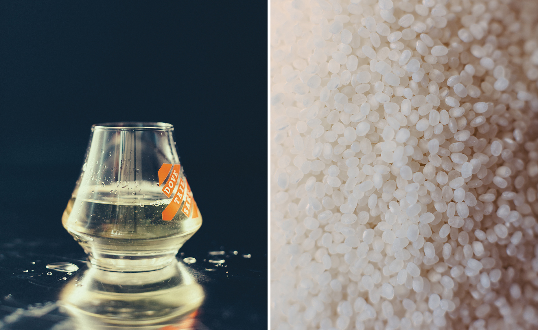 A glass of beer with condensation on it next to grains of rice.