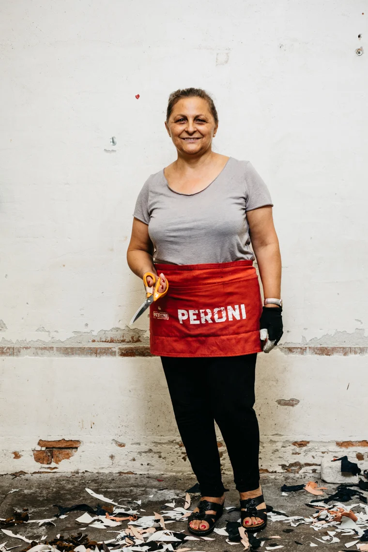 Woman-Posing-With-Scissors-Fratelli-Guarino-Tannery-Salofra.jpg