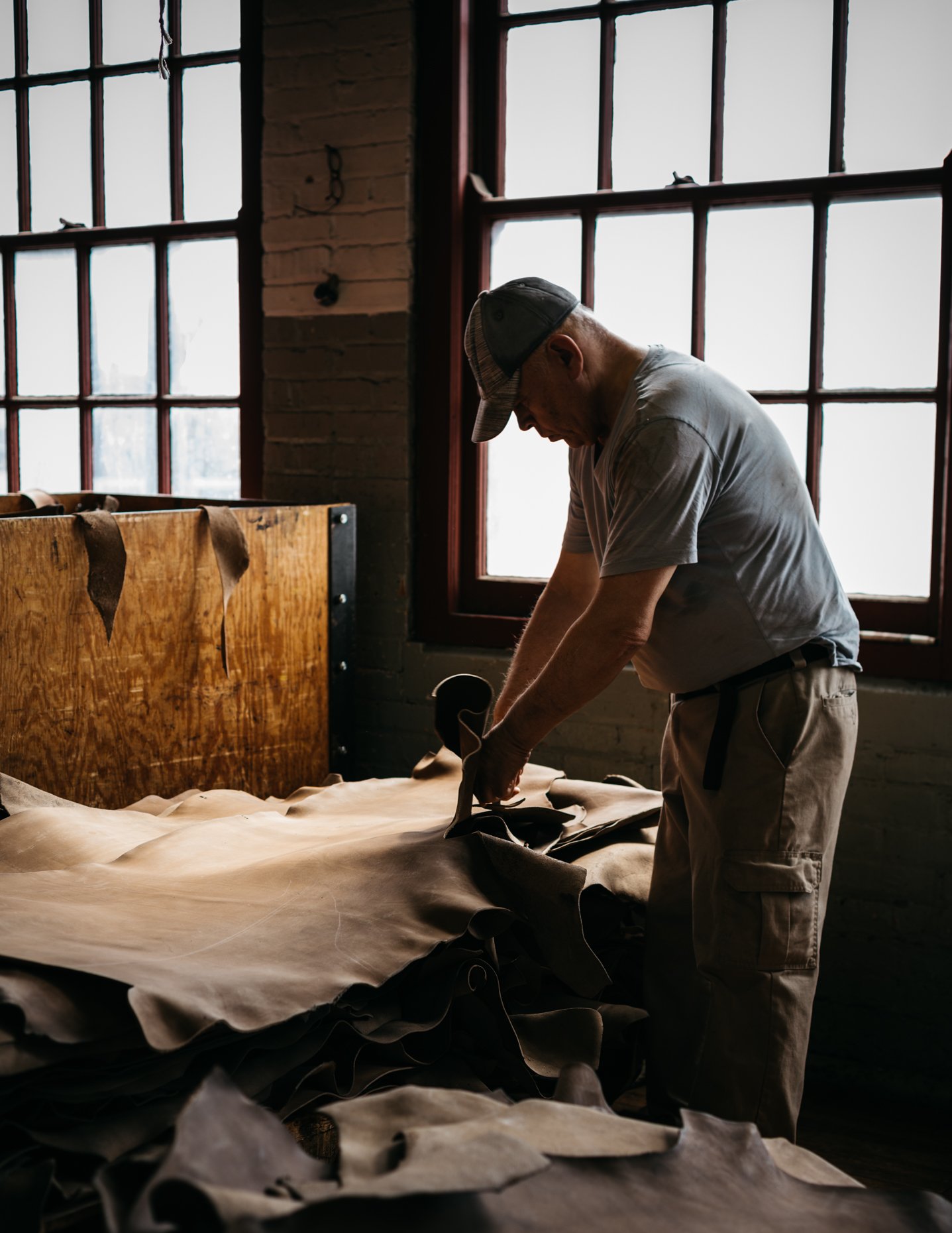Man-Trimming-Hides-Horween-Tannery-Chicago.jpg