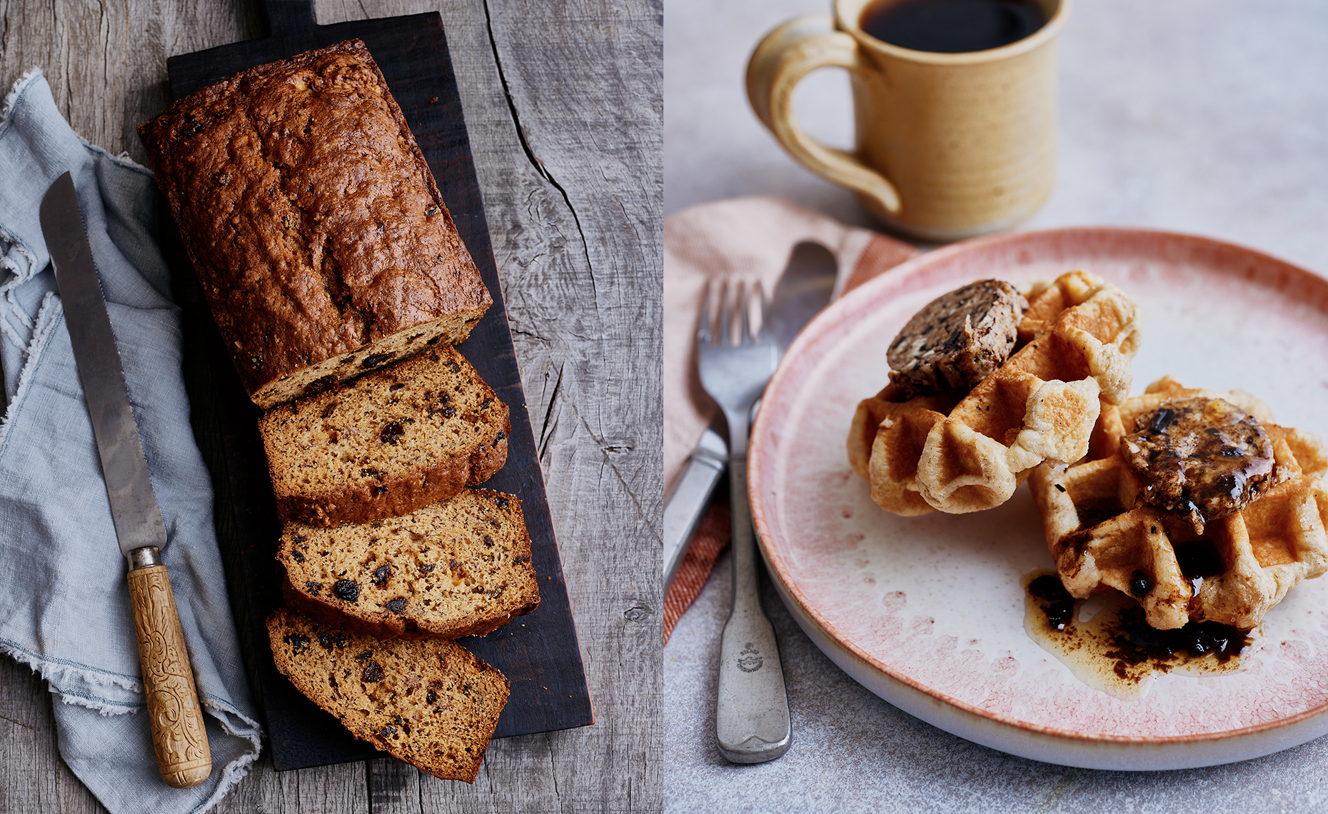 A loaf of fruitcake with slices cut and placed on a dark wooden board on a rustic wooden table, and a plate of waffles topped with fruit, syrup, and a slice of fruitcake, with a cup of coffee in the background.