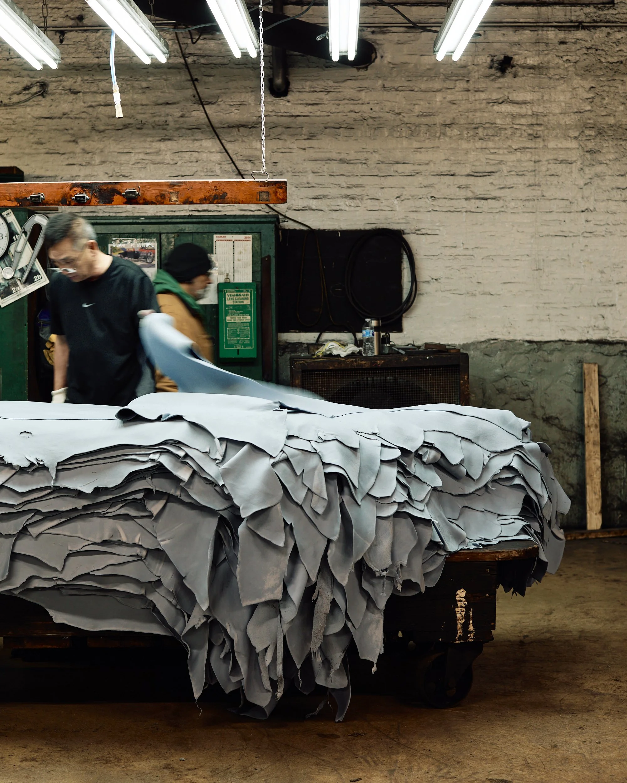 Man-Inspecting-Blues-Horween-Tannery.jpg