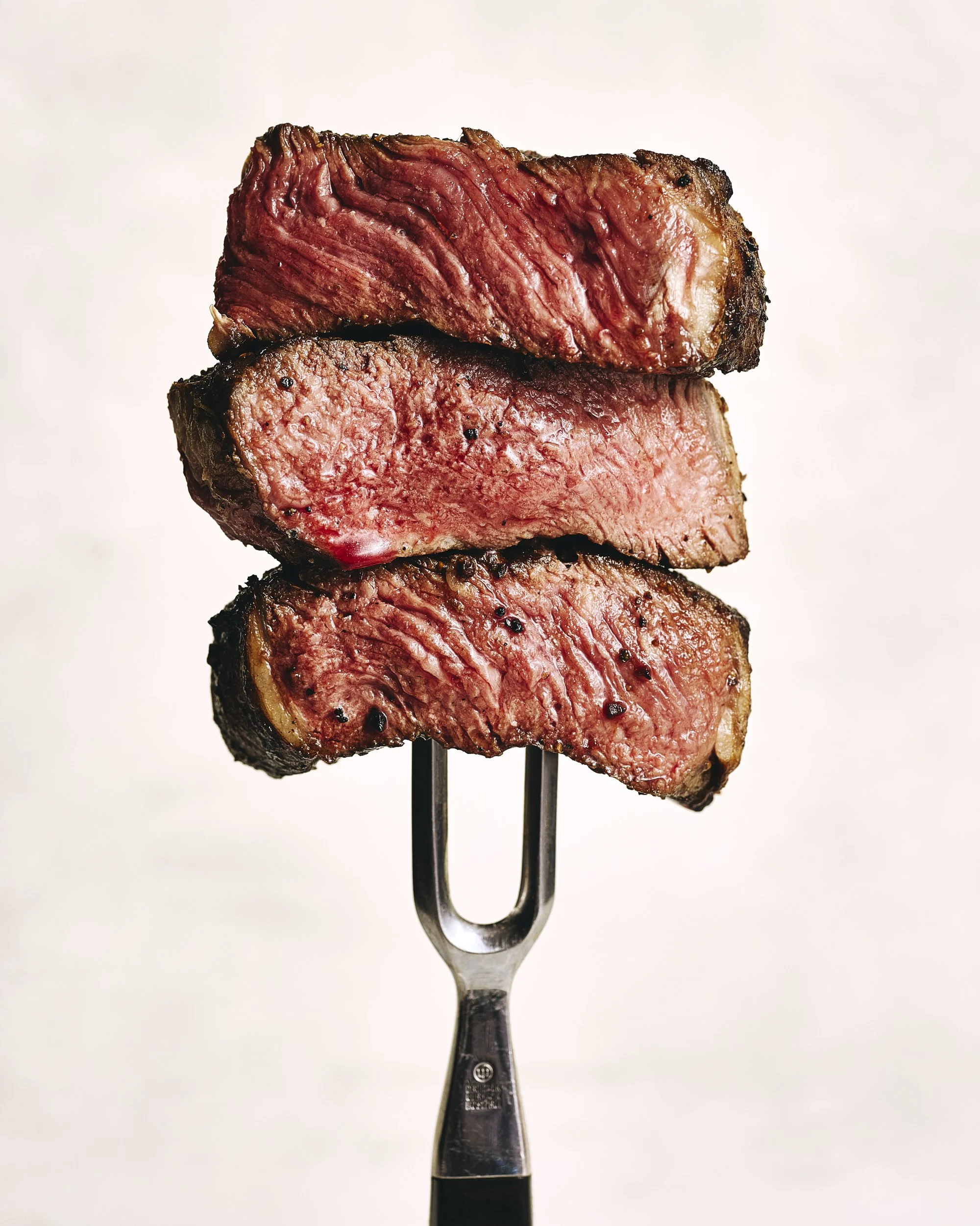 ribeye-slices-on-fork.jpg