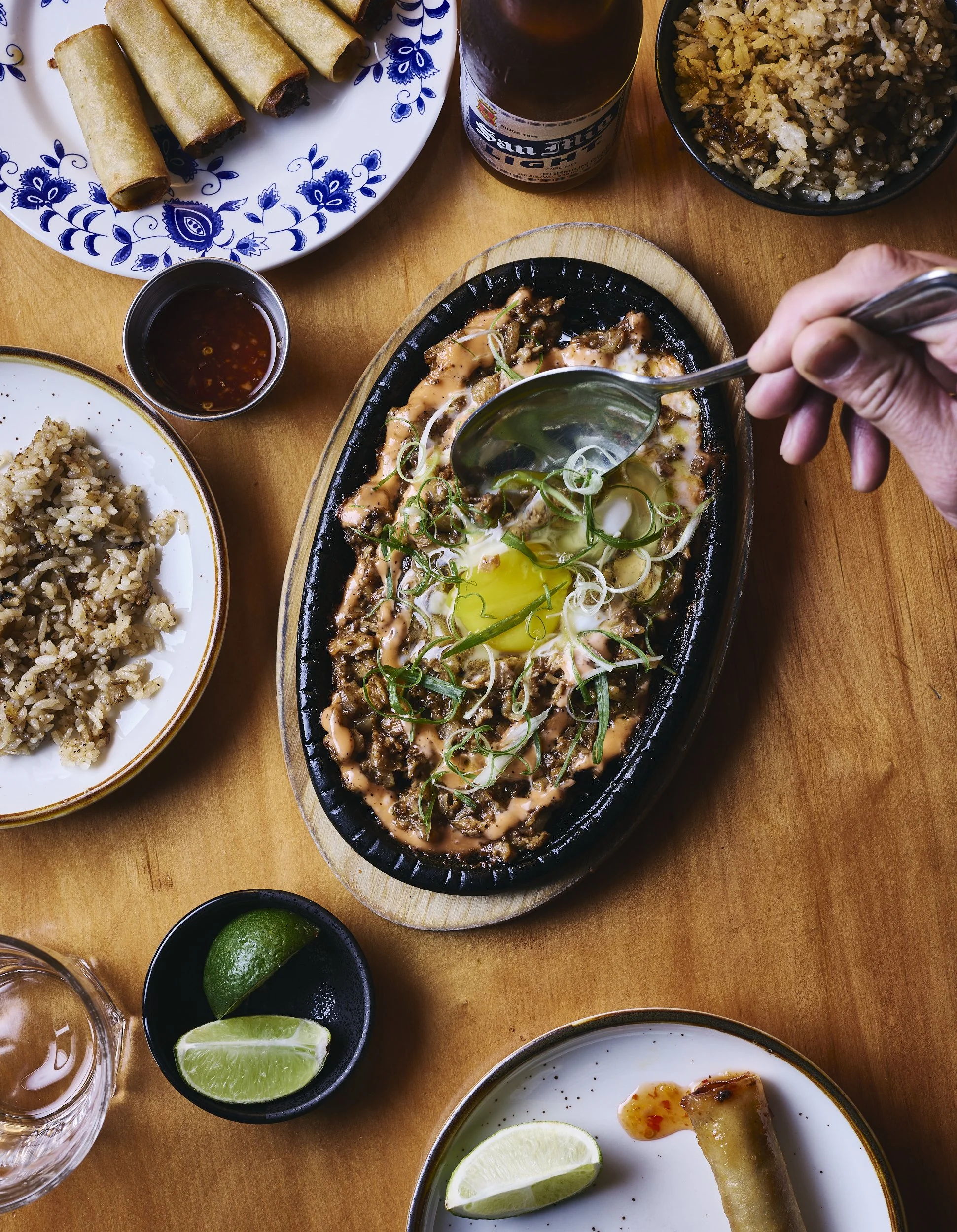 Table-With-Plates-Of-Filipino-Cuisine.jpg