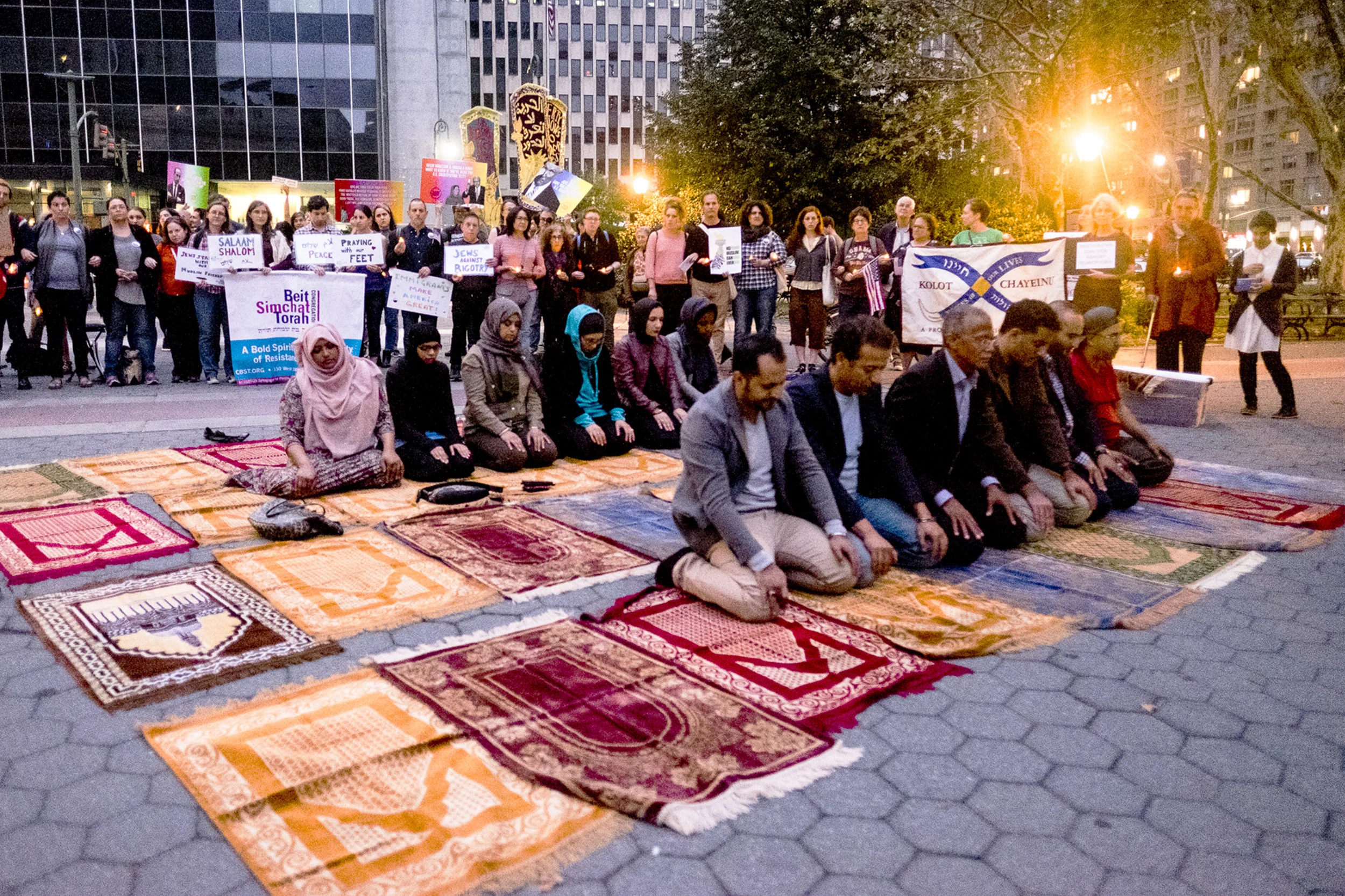 at prayer with supporters.jpg