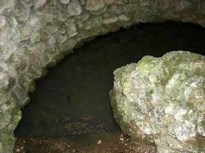 Notice that the pool of healing water forms a spiral, an ancient symbol of the Goddess. Next to it a small basin is hewn out of the rock, probably for drinking and blessing oneself.