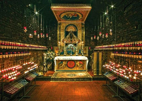 The interior of Fr. Patten's Holy House with the Madonna crowned and robed