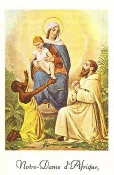 An old holy card depicting Our Lady of Africa, who is actually a Black Madonna in Algiers . It seems that the monk is praying for the freedom of his African convert and Jesus grants his wish, breaking the chains of slavery.