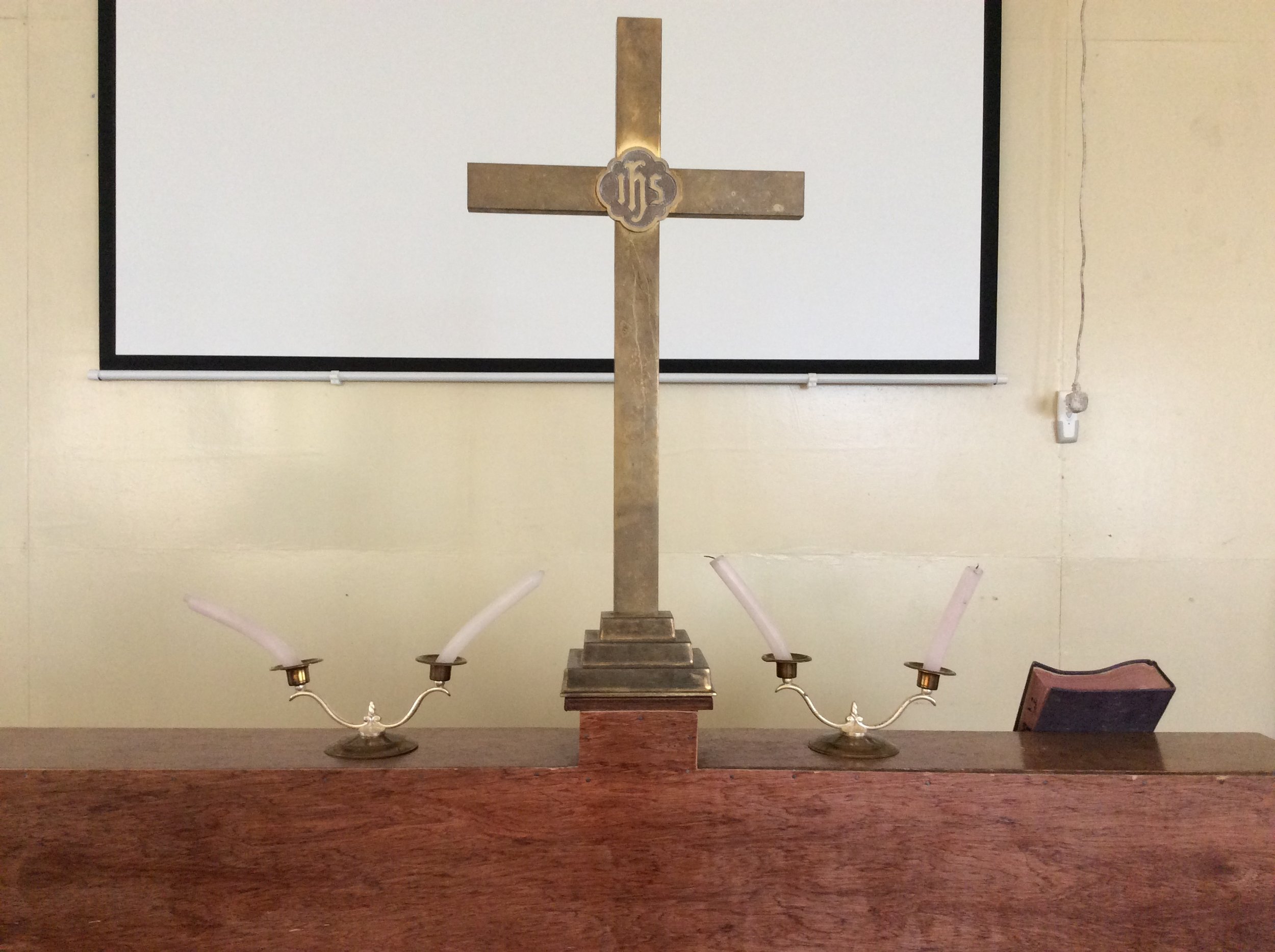  The altar at the School of Theology. &nbsp;We lit three candles for advent. &nbsp;Notice how the candles lean. &nbsp;Africa heat is no joke! 