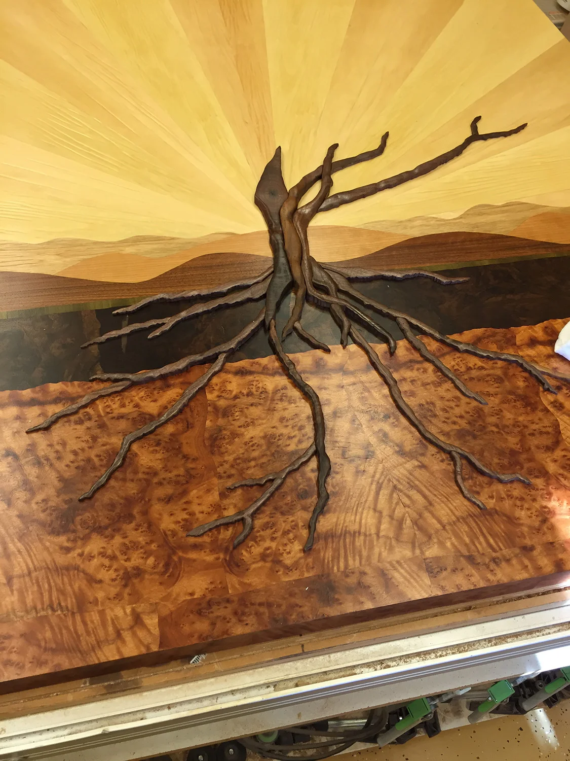 Applying tree parts to the finished background.