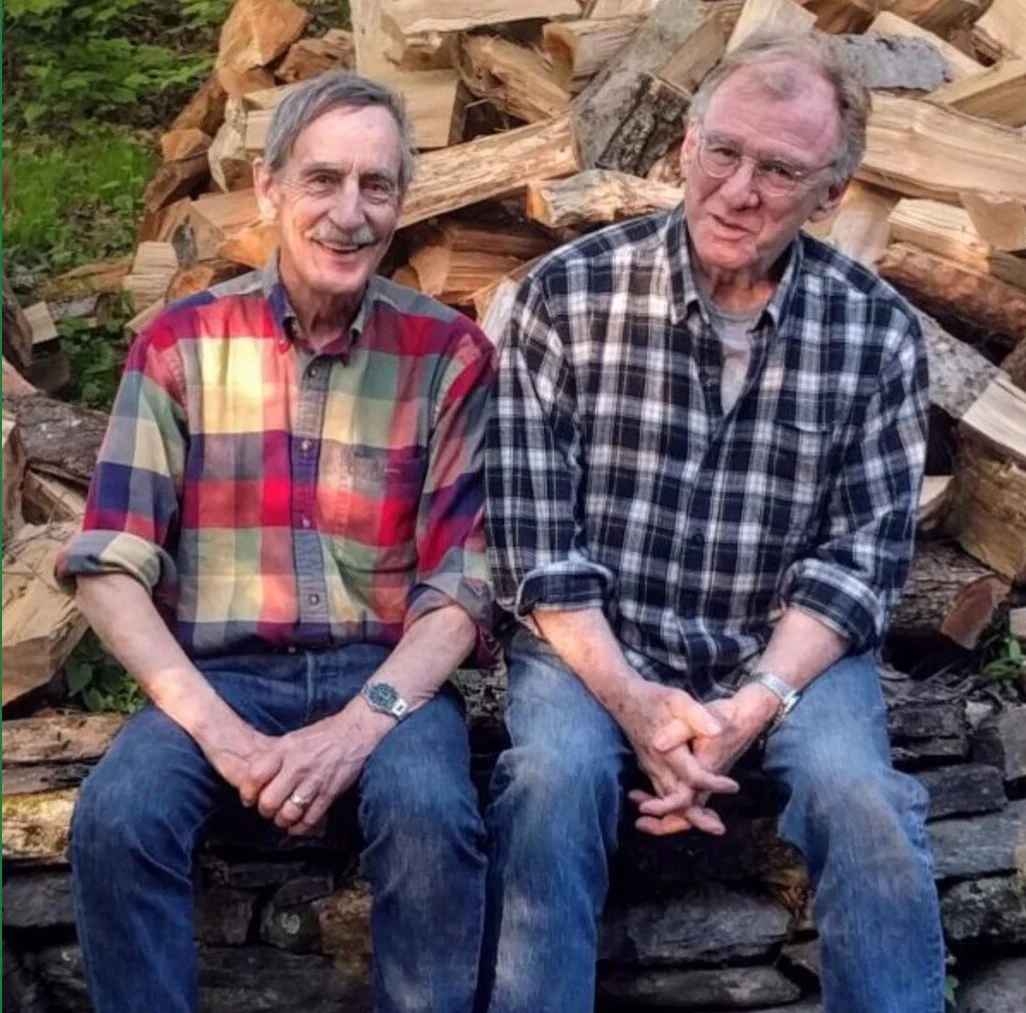 The Full Vermonty authors, Bill Mares and Jeff Danziger, in front of Jeff's woodpile in West Dummerston, Vermont. 