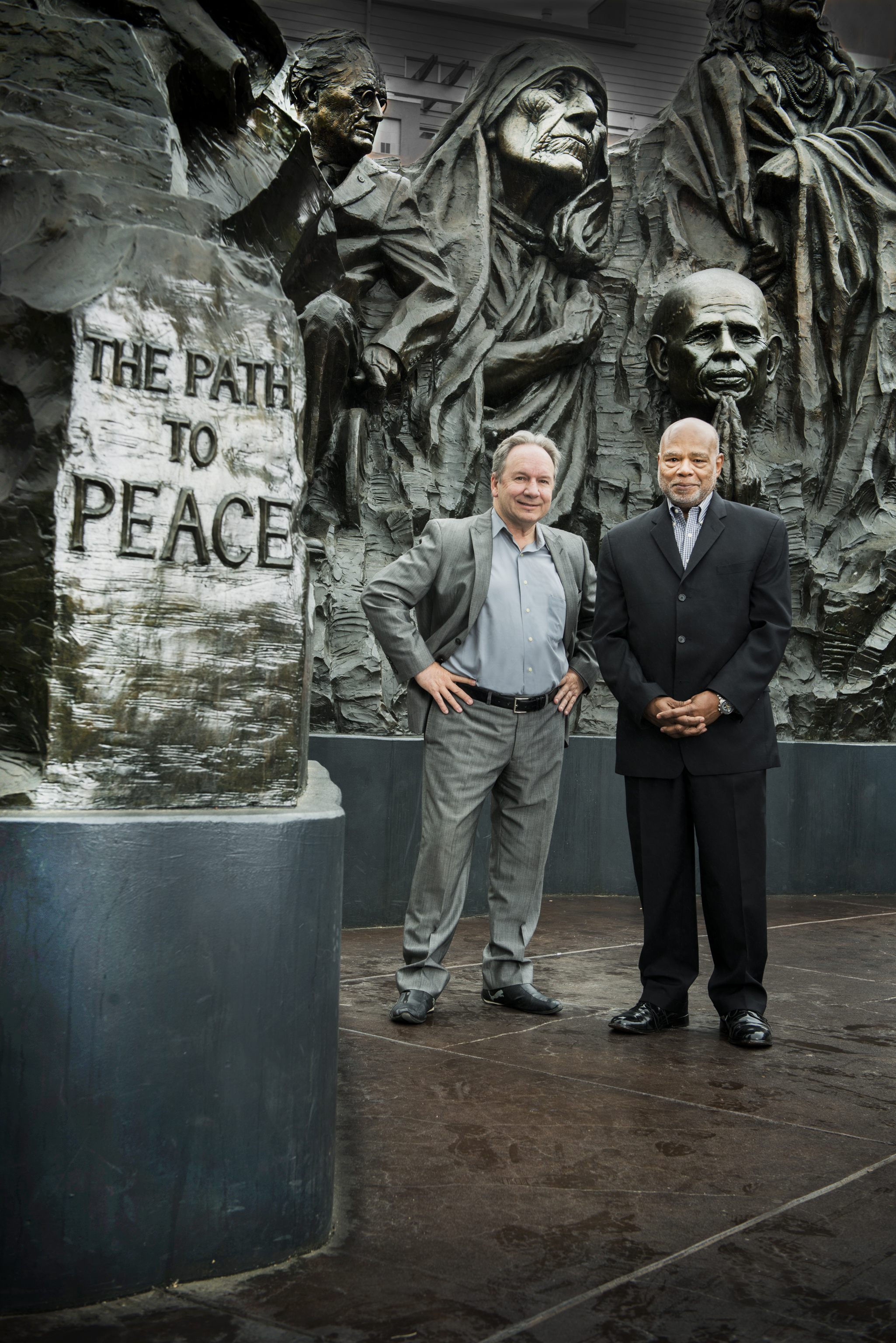 Concept authors Philip Banta and Norman Hooks in front of the “Remember Them: Champions of Humanity” monument at Oakland’s Henry J. Kaiser Memorial Park on 19th St. along the north leg of the West Oakland Walk