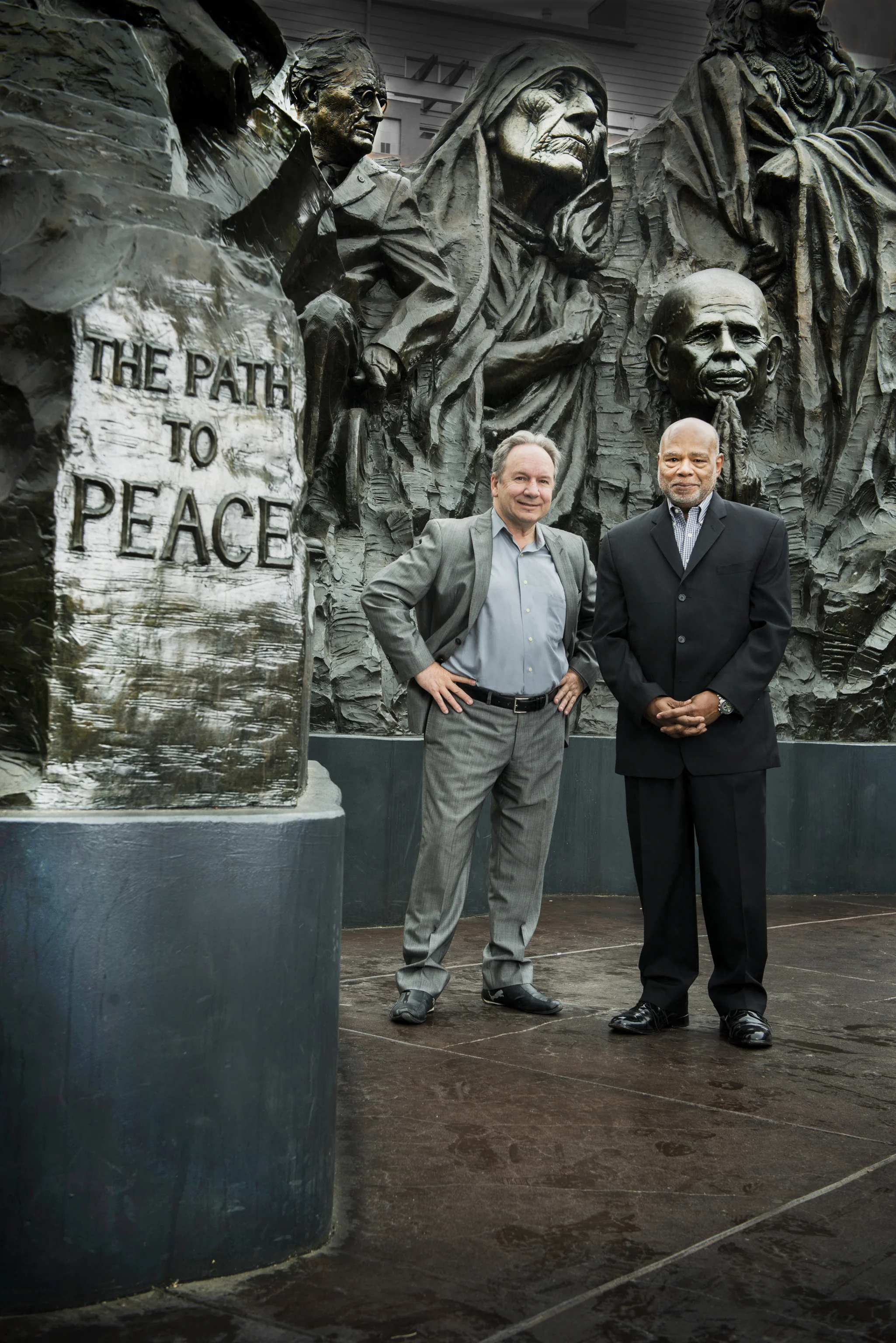 Concept authors Philip Banta and Norman Hooks in front of the “Remember Them: Champions of Humanity” monument at Oakland’s Henry J. Kaiser Memorial Park on 19th St. along the north leg of the West Oakland Walk