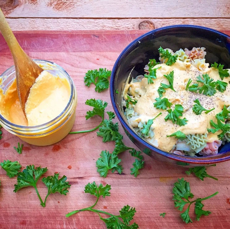 Pictured is the cheese sauce over quinoa pasta topped with black pepper and fresh parsley. 