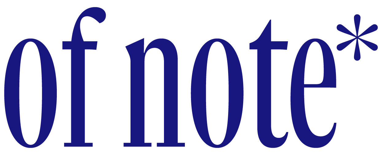 The word 'of note' written in large, dark blue letters with an asterisk at the end.