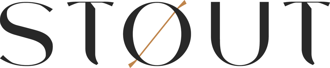 A stylized black and brown dog silhouette facing to the right.