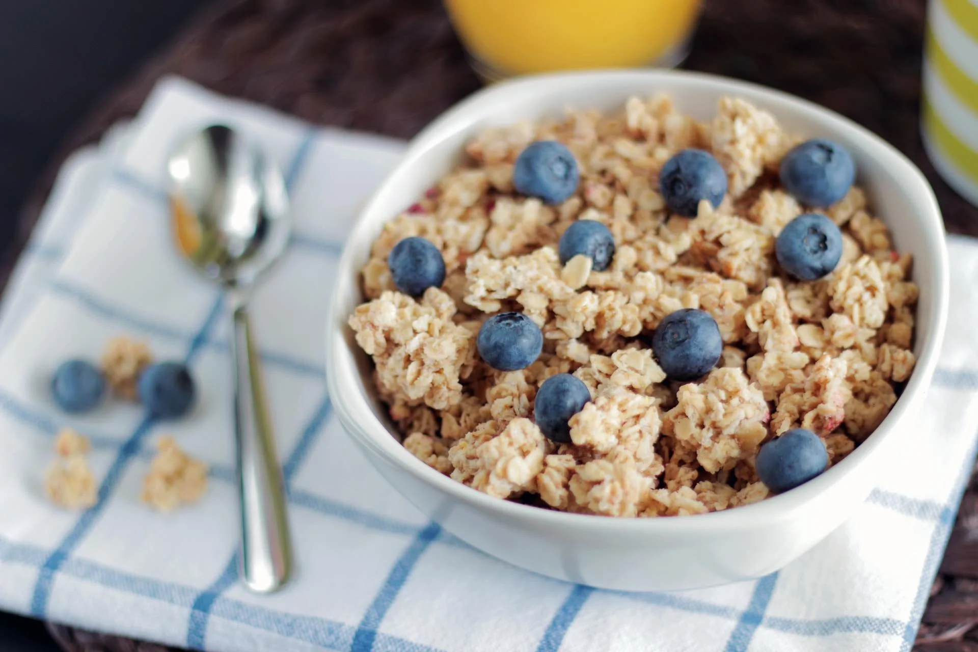 blueberries whole grain granola cereal milk