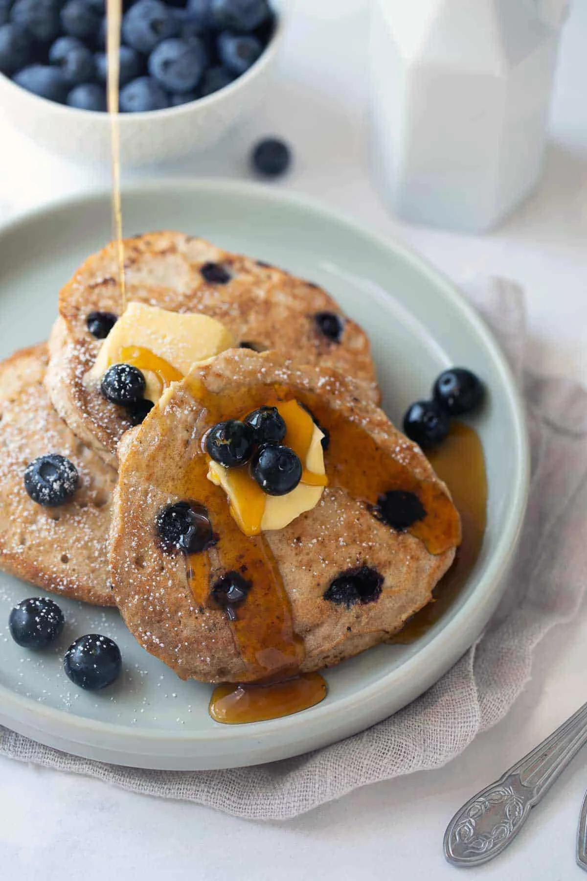 buckwheat pancakes with maple syrup and blueberries