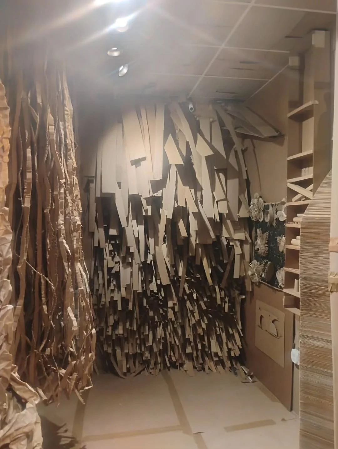 Cardboard installation interior by Calvin Brett for Jason Earl Lorde's The Ministry of Cardboard
