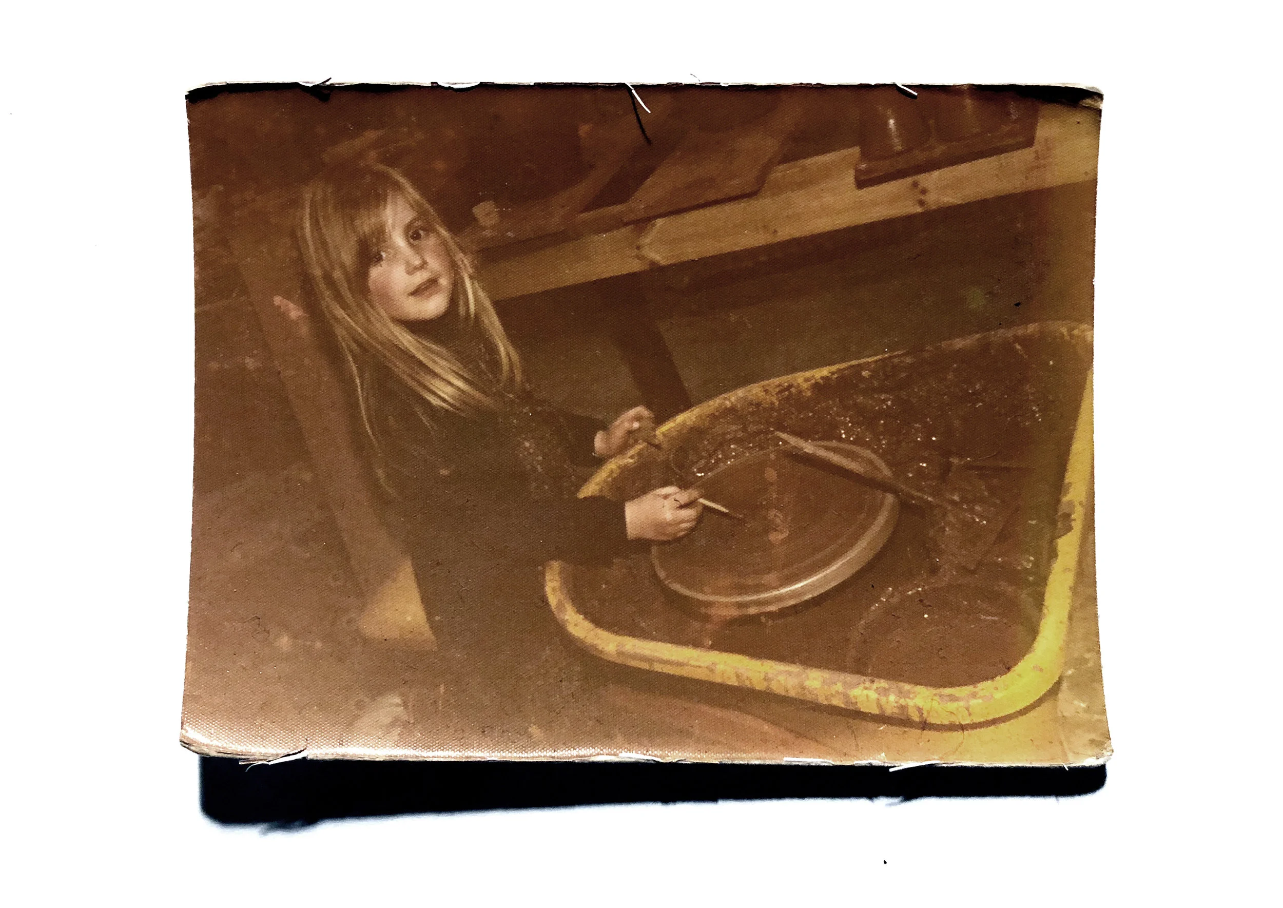 Claire at the wheel in Oxnam in the Scottish Borders aged 6