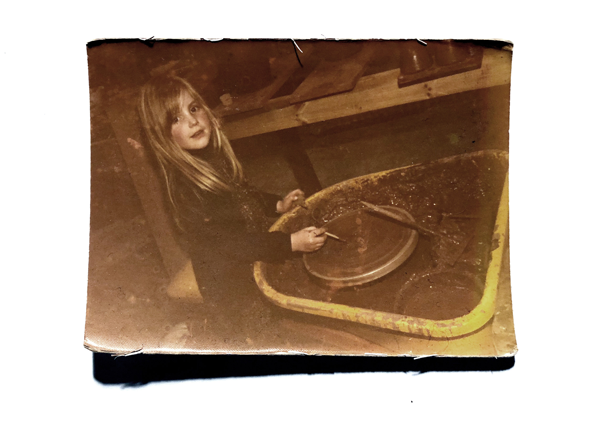 Claire at the wheel in Oxnam in the Scottish Borders aged 6