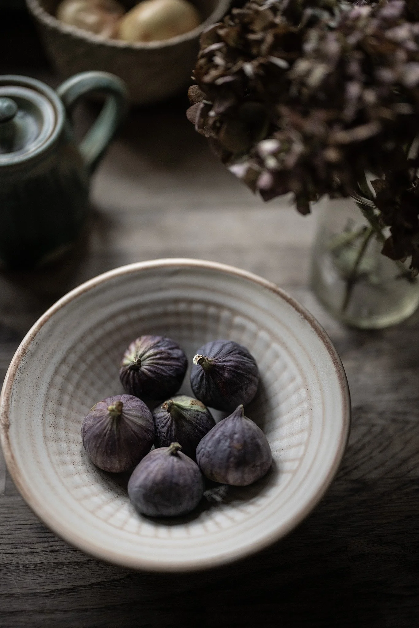 Our oatmeal stoneware bowl and some of the dried head of hydrangeas from my garden.