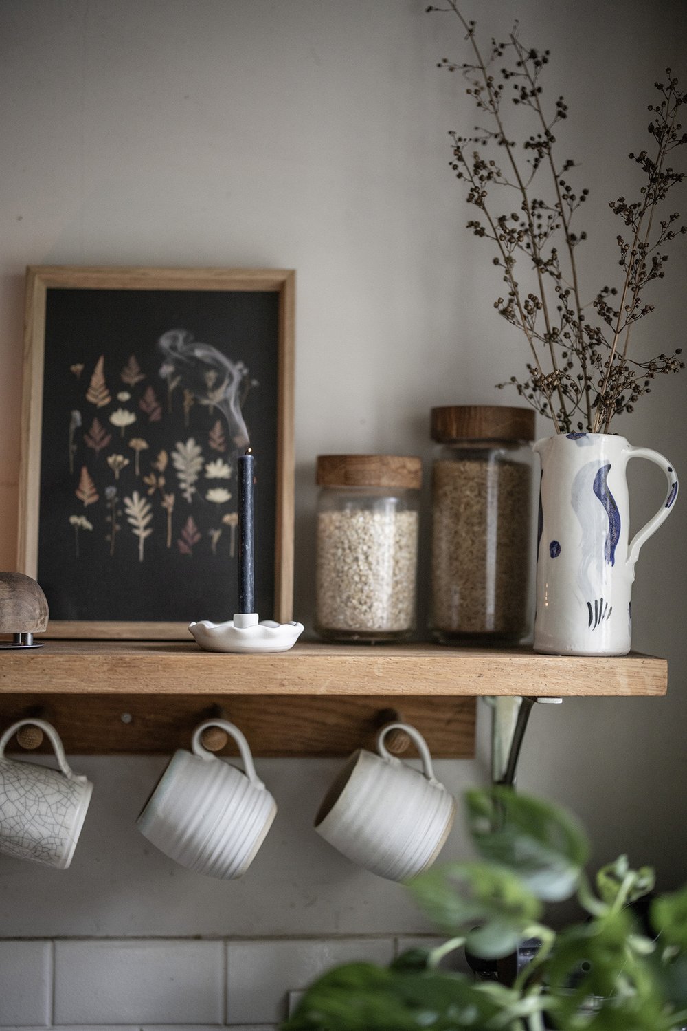 Burning an Embers candle, alongside one of our new tall, painterly jugs.