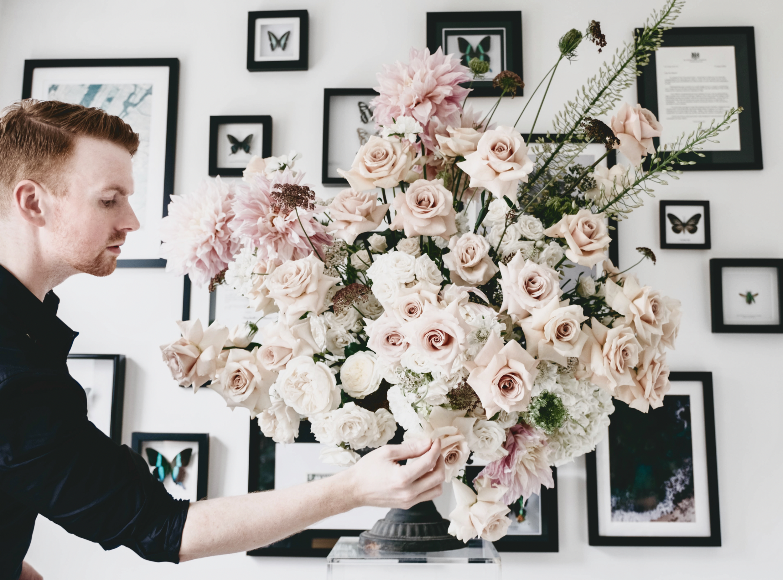 Joseph Massie creating a bespoke piece of floral art during The Intensive 1:1 sessions, demonstrating refined floral design, movement and composition as part of private floristry training at The UK School of Floristry..