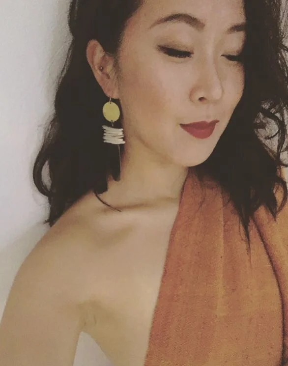Jenny wearing The Tide Earring
