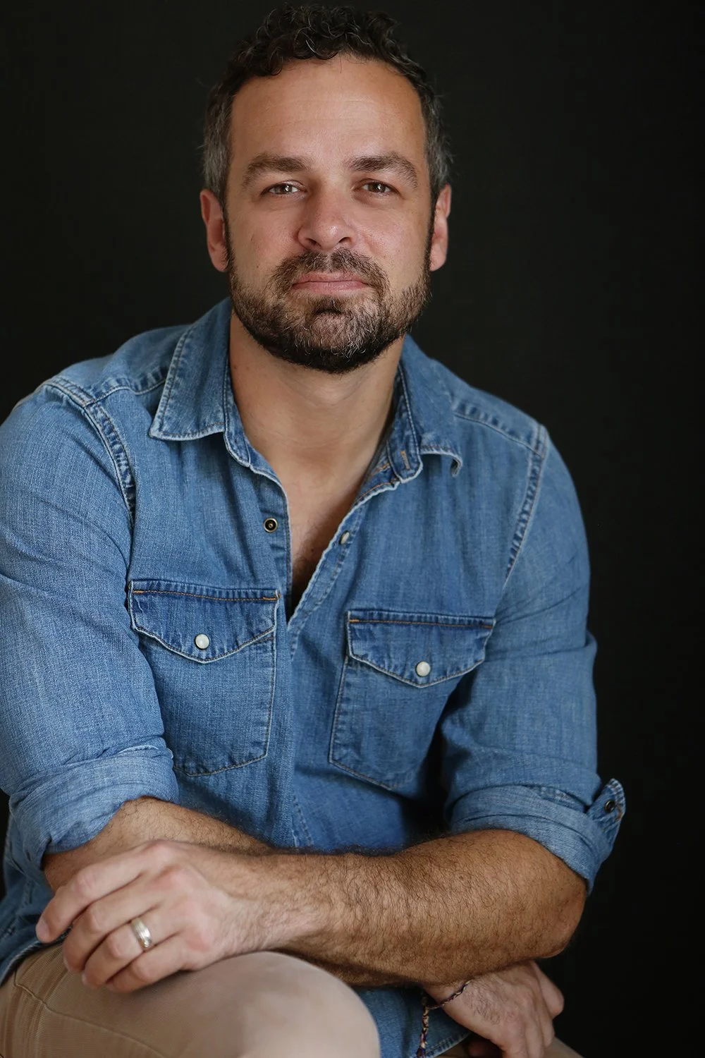 headshot of a man by Rachel Garrison