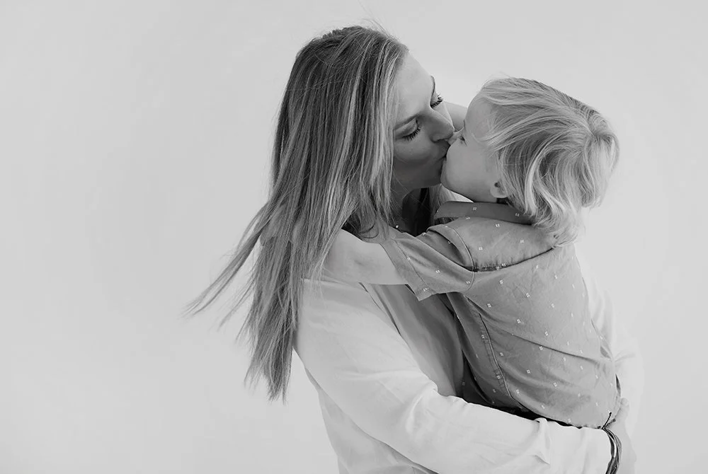 mother and child black and white portrait by Rachel Garrison