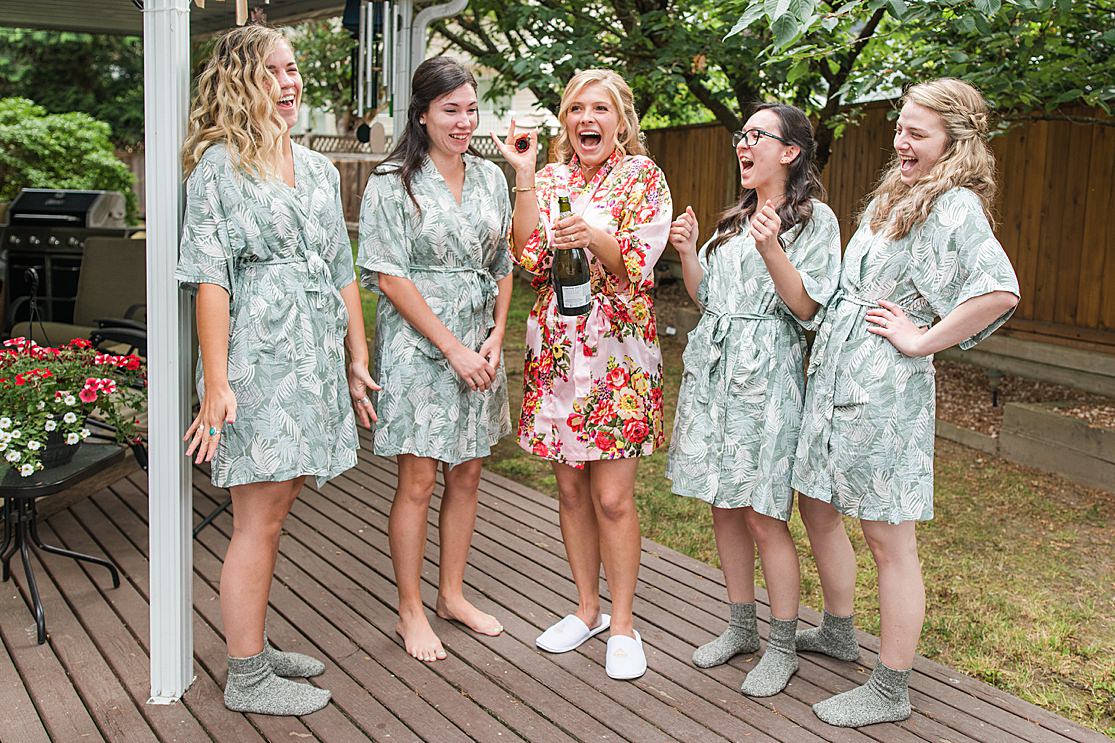 bridesmaids and bride in robes taken by west midlands wedding photographer Lisa Lander
