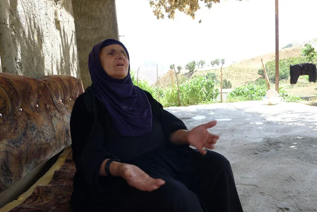 Khatun Ali talking to CPTers at her home in Shora. Photo by: Julie Brown