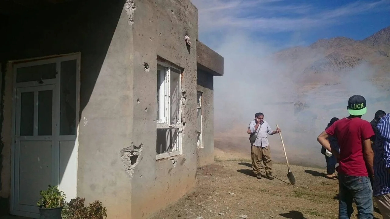 The villagers trying to control the fire.
