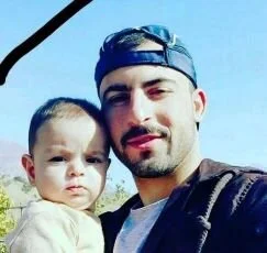 Himda’at Othman with his son.