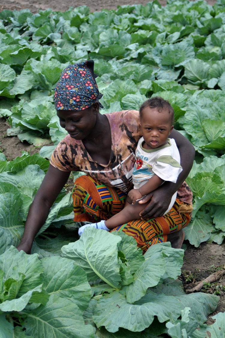 Mama student with her child in cabbage.jpg